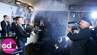 Oscars 2019 Rami Malek celebrates Oscar by spraying a magnum of champagne [upl. by Eimareg418]