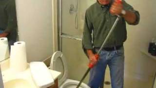 How to Clear a Toilet Clog using a Closet Auger [upl. by Rehtae130]