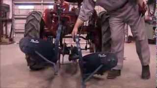 How to install a Farmall Cub 189 Two Way Plow [upl. by Osanna493]