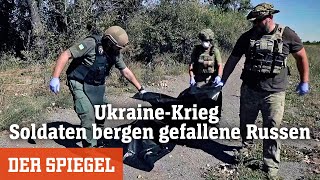 UkraineKrieg Soldaten bergen gefallene Russen auf der »Straße des Todes«  DER SPIEGEL [upl. by Enelym]