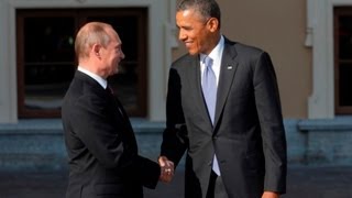 Obama and Putin greet with long handshake [upl. by Amabil]