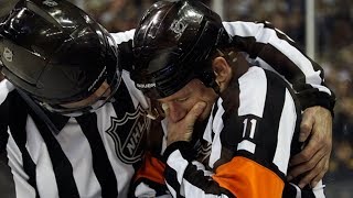 NHL Refs Getting Hit [upl. by Enutrof]