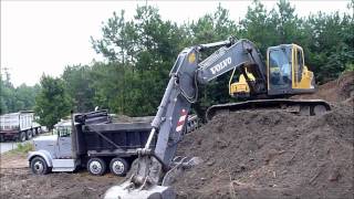 Volvo EC210 Excavator Rocking Out Trucks [upl. by Eanahs501]