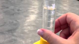 How to read the volume of a liquid in a graduated cylinder [upl. by Natanoy]