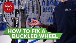 How To Fix A Buckled Bike Wheel [upl. by Lauro6]