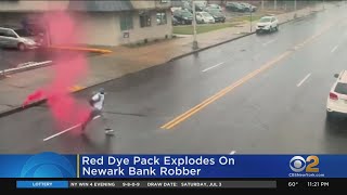 Red Dye Pack Explodes On Newark Bank Robber [upl. by Yssor]