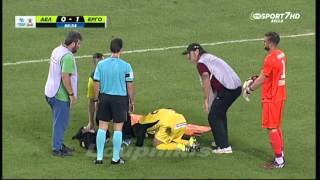 Greek stretcher bearers drop injured player while taking him off pitch [upl. by Bodwell]