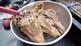 How to eat Goats Head in Nigeria [upl. by Ymmaj70]