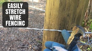 Stretching a wire fence [upl. by Ahsiekram81]