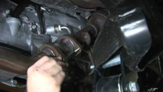 Installing Rough Country Jeep JK Exhaust Spacer [upl. by Noired]