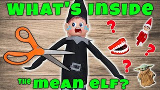 Whats Inside The Mean Elf On The Shelf Cutting Open Evl [upl. by Oniliuqnart]