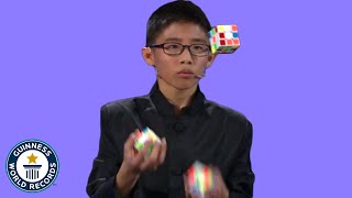 He JUGGLED and SOLVED 3 Rubiks cubes  Guinness World Records [upl. by Nave418]