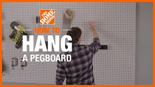 How to Hang a Pegboard  The Home Depot [upl. by Jarrett]