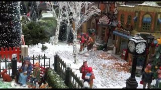 Christmas Village Displays  with Lemax houses Department 56 models trees snowmen and figurines [upl. by Pros]